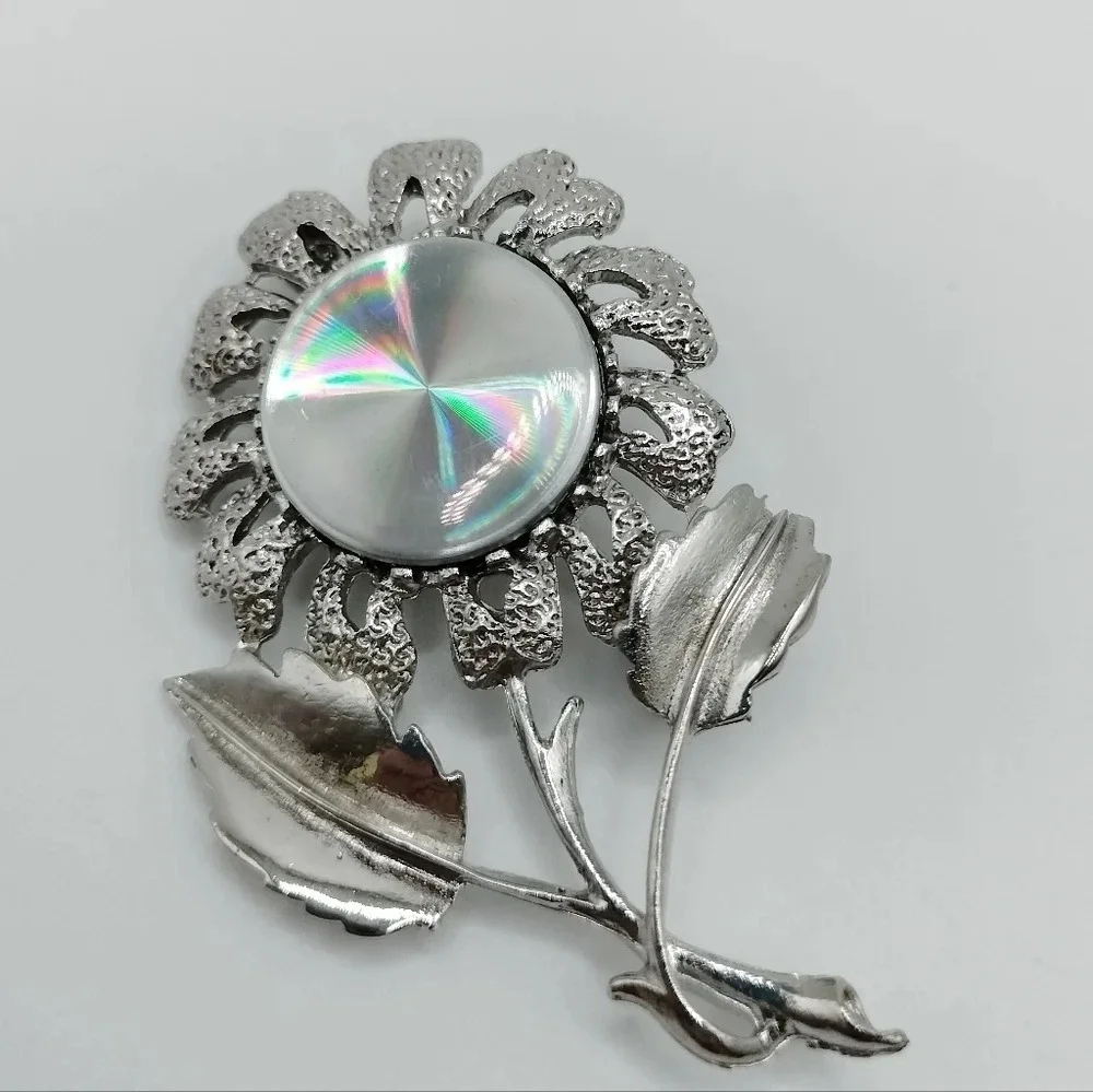 JEWELERAMA 1960s Book Piece Brooch Reflective Center Vintage Jewelry